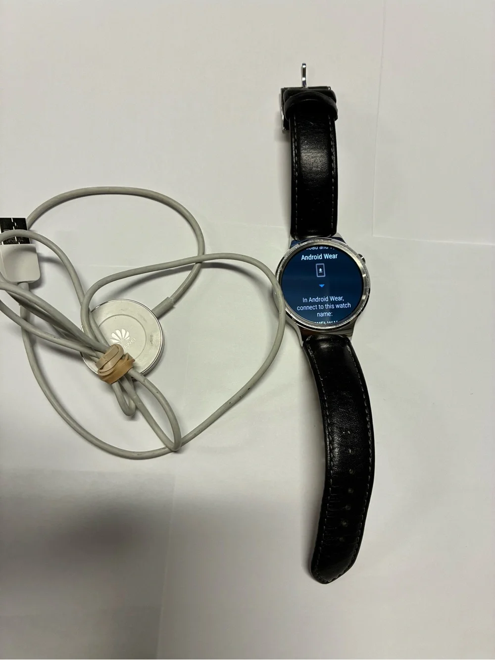 Huawei Smartwatch with Black Leather Strap and Silver Case